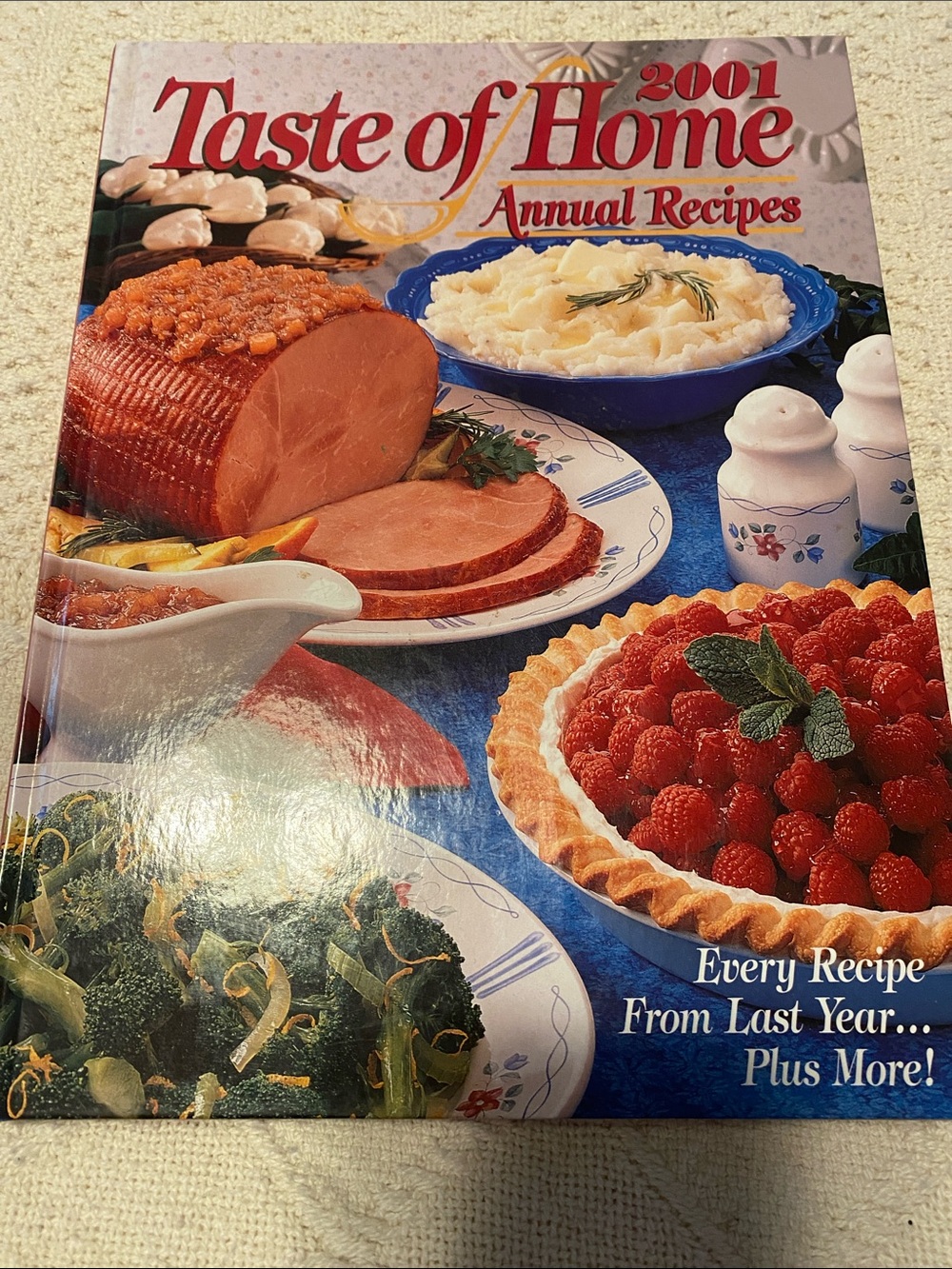 Taste of Home Cookbook with Blue and Red Cover Artwork